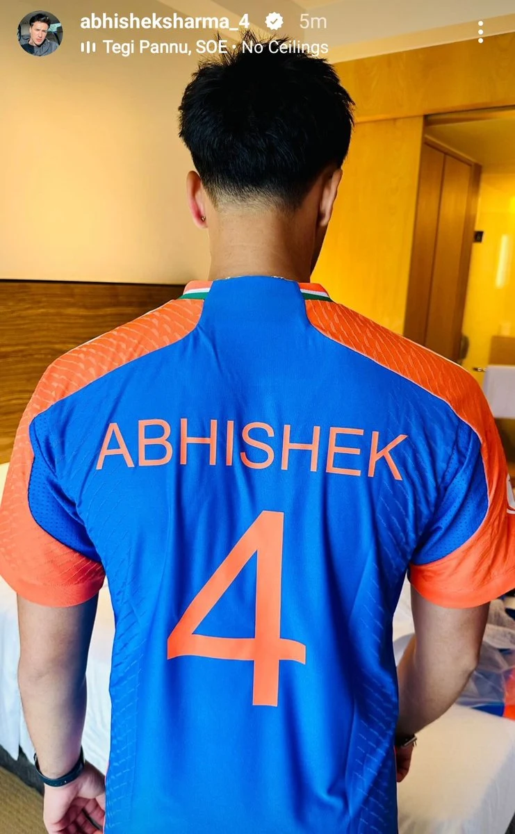 Abhishek Sharma wearing India cricket jersey number 4, viewed from behind