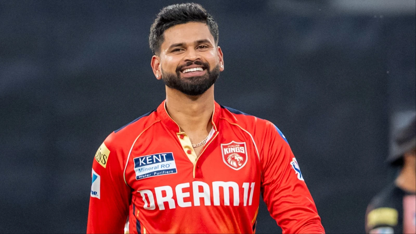 Shreyas Iyer smiling in Punjab Kings jersey during the IPL