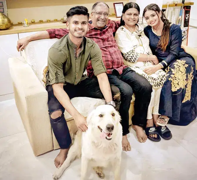 Shreyas Iyer with parents Santosh and Rohini, sister Shreshta and family dog at home