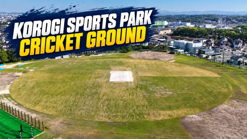 Aerial view of Korogi Sports Park Cricket Ground in Nisshin, Japan, showing the oval field, central cricket pitch and surrounding city area.