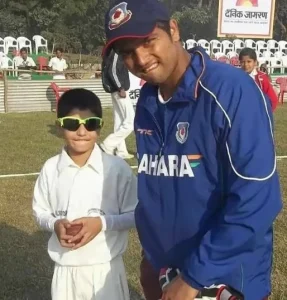 Young Sameer Rizvi at a cricket ground during his early years, reflecting the childhood beginnings of his cricket journey in Meerut.