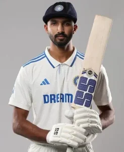 Devdutt Padikkal in India Test cricket jersey holding a bat