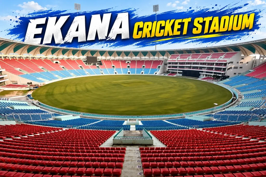 Ekana Cricket Stadium in Lucknow with a wide view of the cricket field, red and blue seating stands, and stadium floodlights.