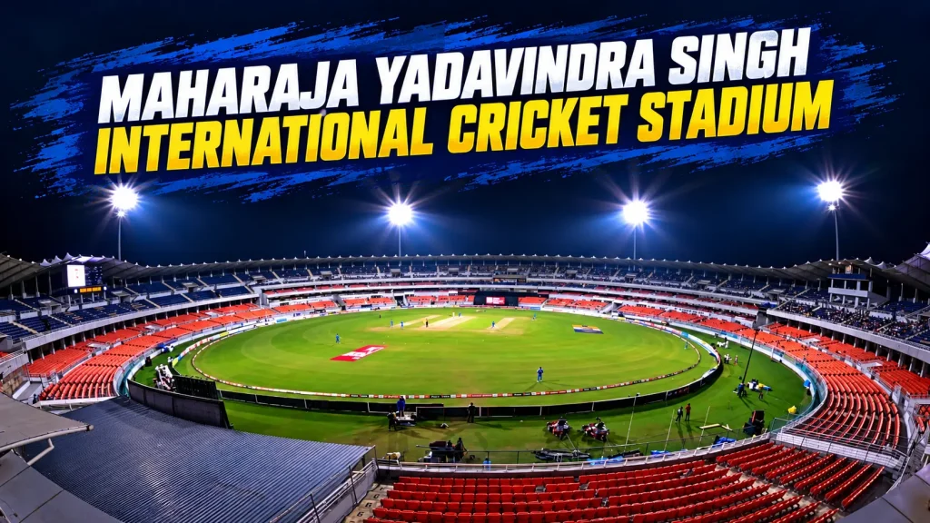 Maharaja Yadavindra Singh International Cricket Stadium in New Chandigarh under floodlights during a cricket match.