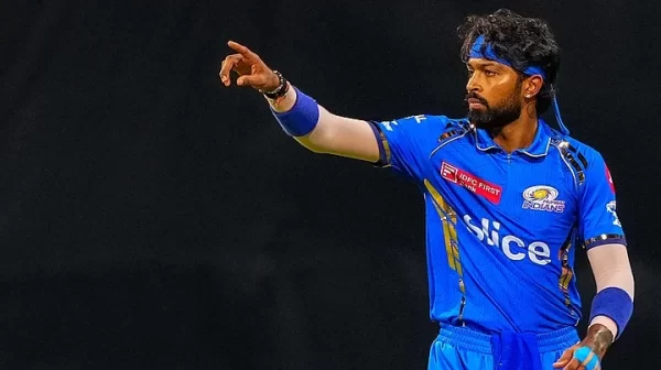 Hardik Pandya directing teammates while representing Mumbai Indians during an IPL match.