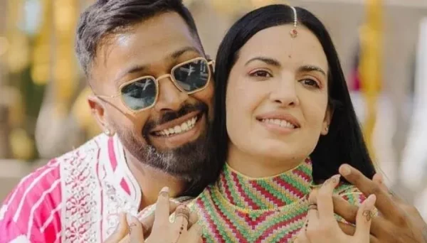 Hardik Pandya posing closely with former wife Natasa Stankovic in traditional outfits.