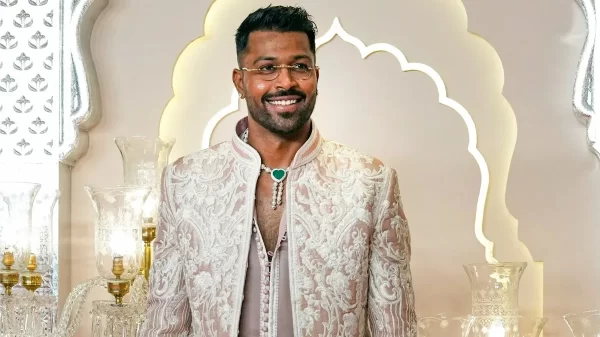 Hardik Pandya wearing an embroidered formal outfit at a luxury celebration.