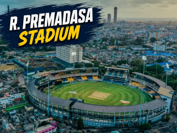 Aerial view of R. Premadasa Stadium in Colombo, showing the cricket ground, surrounding stands, floodlights and city skyline.