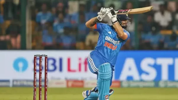 Rinku Singh playing an attacking batting shot for India during an international cricket match.