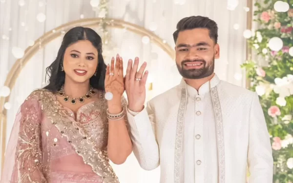 Rinku Singh and Priya Saroj displaying their engagement rings during their engagement ceremony.