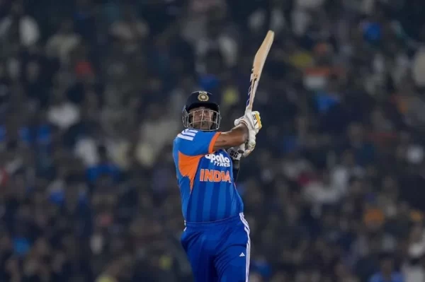 Suryakumar Yadav playing an attacking shot for India, representing his BCCI contract and international match earnings.