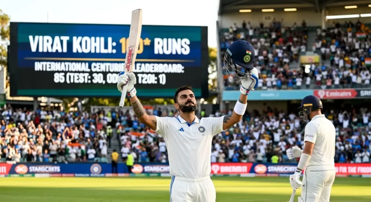 Virat Kohli celebrating century in Test cricket whites raising bat and helmet towards crowd with stadium scoreboard showing "VIRAT KOHLI: 100* RUNS INTERNATIONAL CENTURIES LEADERBOARD: 85 (TEST: 30, ODI: 54, T20I: 1)" illustrating most centuries in international cricket rankings where Kohli stands second all-time behind Sachin Tendulkar's 100 centuries